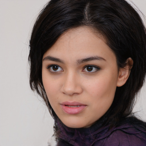 Neutral white young-adult female with medium  brown hair and brown eyes