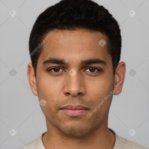 Neutral latino young-adult male with short  black hair and brown eyes