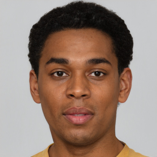 Neutral black young-adult male with short  black hair and brown eyes