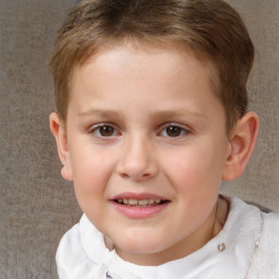 Joyful white child female with short  brown hair and brown eyes