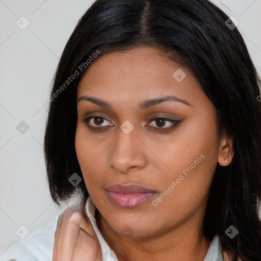 Joyful asian young-adult female with long  brown hair and brown eyes