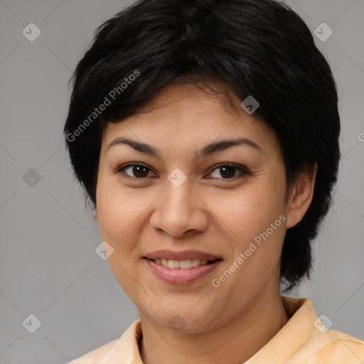 Joyful latino young-adult female with medium  brown hair and brown eyes