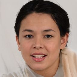 Joyful asian young-adult female with medium  brown hair and brown eyes