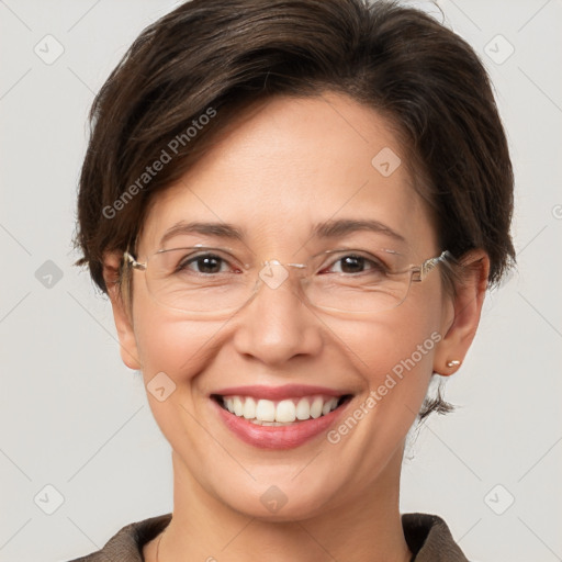 Joyful white adult female with short  brown hair and brown eyes