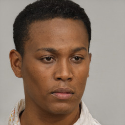 Neutral black young-adult male with short  brown hair and brown eyes