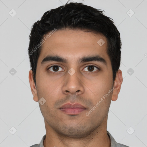 Neutral latino young-adult male with short  black hair and brown eyes