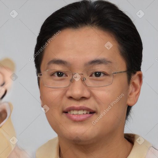 Joyful asian adult female with short  brown hair and brown eyes