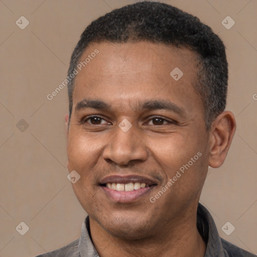 Joyful latino adult male with short  black hair and brown eyes