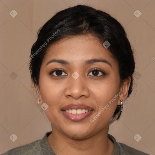 Joyful latino young-adult female with medium  brown hair and brown eyes