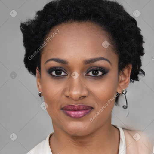 Joyful black young-adult female with short  black hair and brown eyes