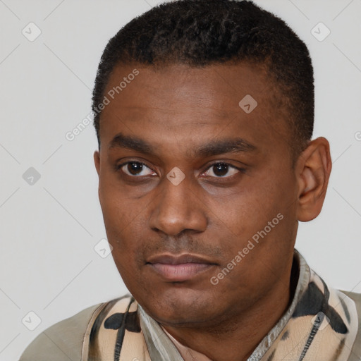 Neutral latino young-adult male with short  black hair and brown eyes