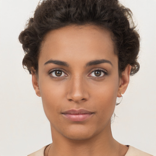 Neutral white young-adult female with short  brown hair and brown eyes