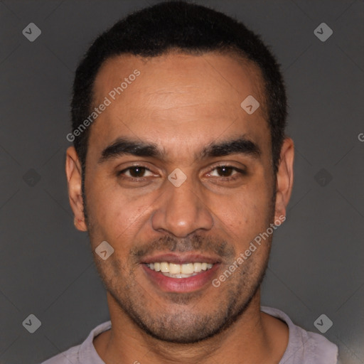 Joyful latino young-adult male with short  black hair and brown eyes