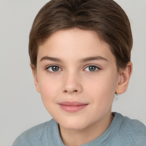 Joyful white child female with short  brown hair and brown eyes