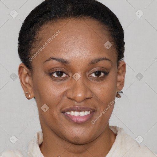 Joyful black young-adult female with short  brown hair and brown eyes