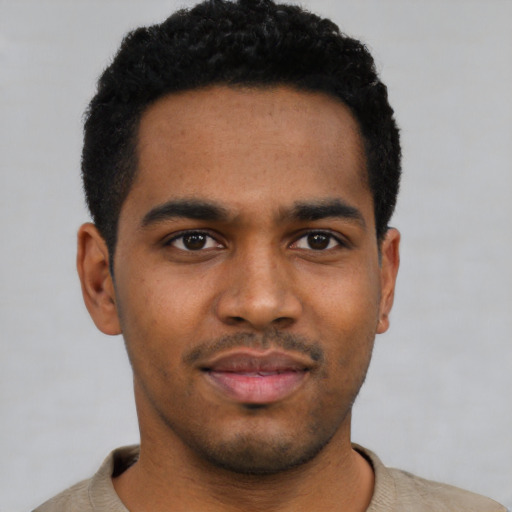 Neutral black young-adult male with short  black hair and brown eyes
