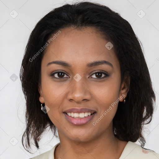 Joyful black young-adult female with medium  brown hair and brown eyes