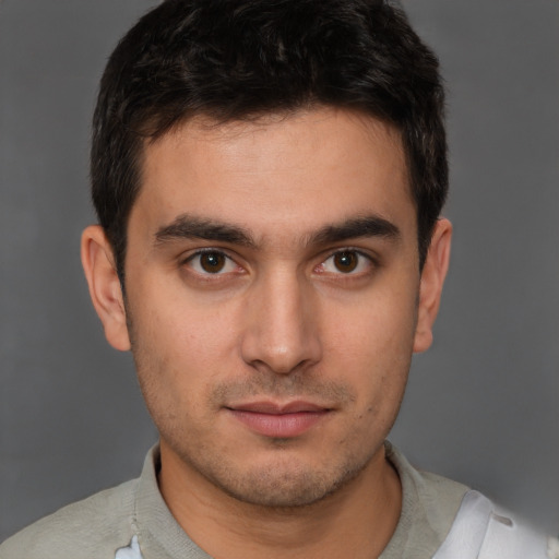 Neutral white young-adult male with short  brown hair and brown eyes