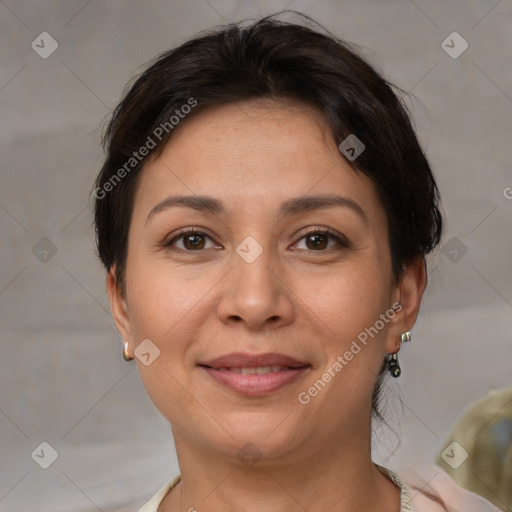 Joyful white adult female with short  brown hair and brown eyes