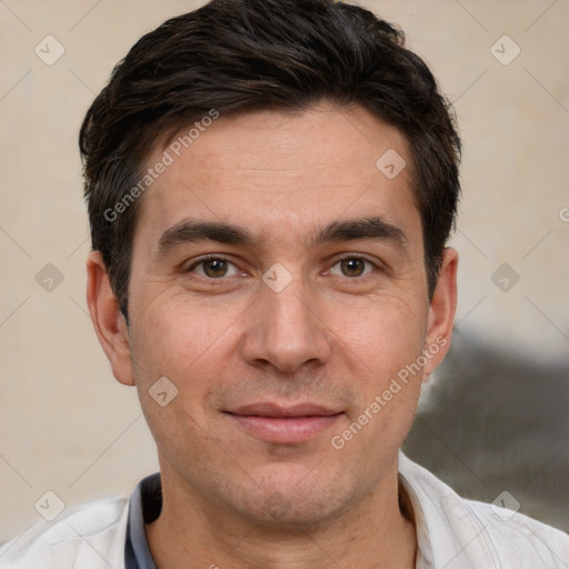 Joyful white adult male with short  brown hair and brown eyes