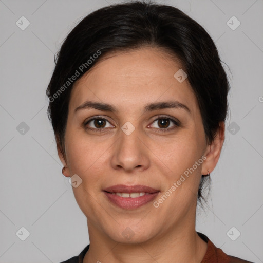 Joyful white adult female with medium  brown hair and brown eyes