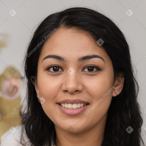 Joyful latino young-adult female with long  brown hair and brown eyes