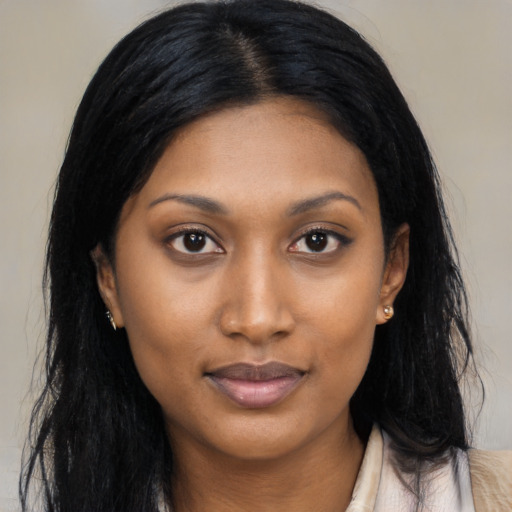 Joyful asian young-adult female with long  black hair and brown eyes