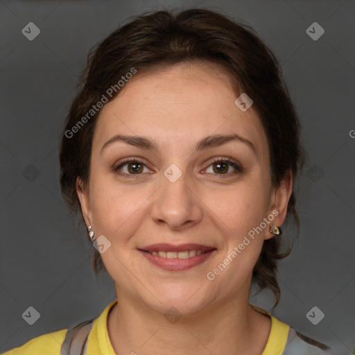 Joyful white adult female with short  brown hair and grey eyes