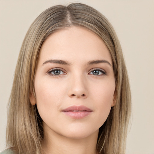 Neutral white young-adult female with long  brown hair and brown eyes