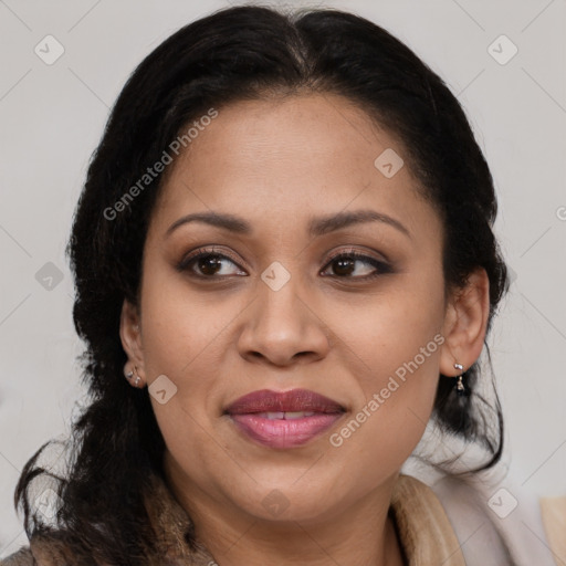 Joyful black adult female with medium  brown hair and brown eyes