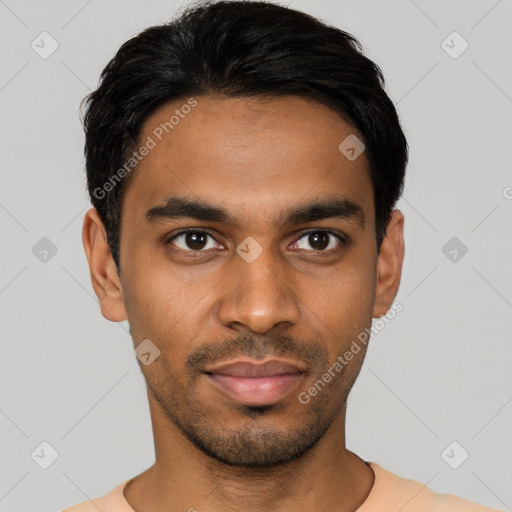 Joyful latino young-adult male with short  black hair and brown eyes