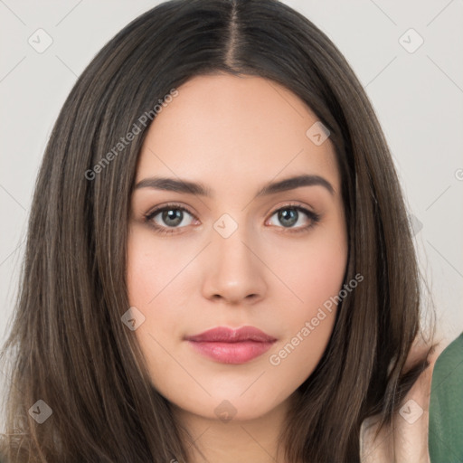 Neutral white young-adult female with long  brown hair and brown eyes