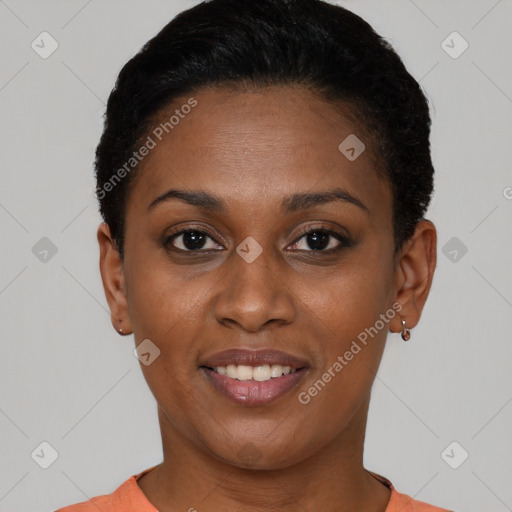 Joyful black young-adult female with short  black hair and brown eyes