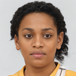 Neutral black young-adult female with short  brown hair and brown eyes