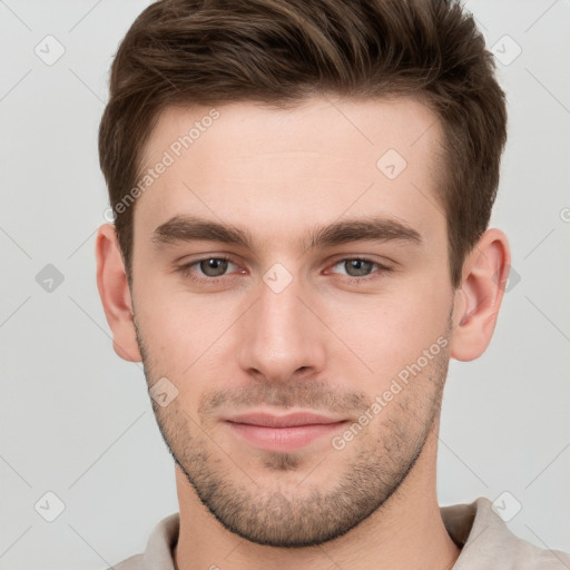 Neutral white young-adult male with short  brown hair and grey eyes