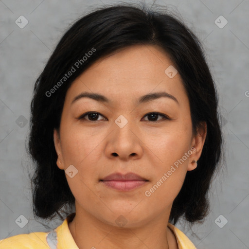 Joyful asian young-adult female with medium  brown hair and brown eyes