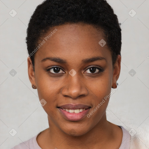 Joyful black young-adult female with short  brown hair and brown eyes