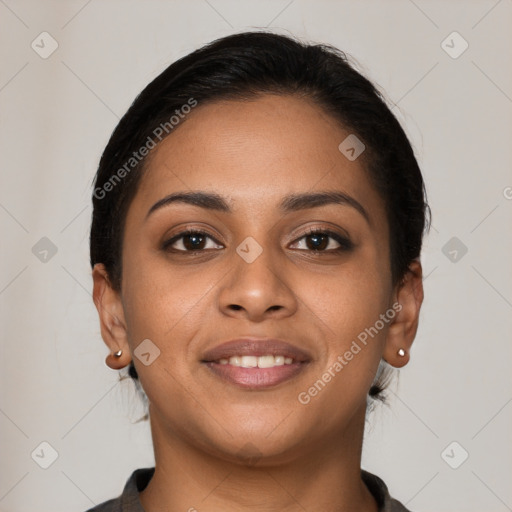 Joyful latino young-adult female with short  brown hair and brown eyes