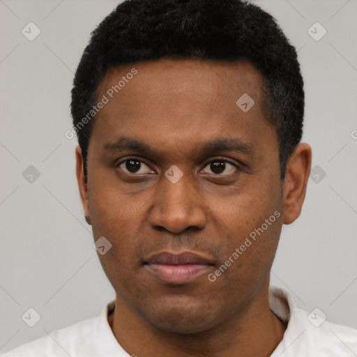 Neutral latino young-adult male with short  black hair and brown eyes