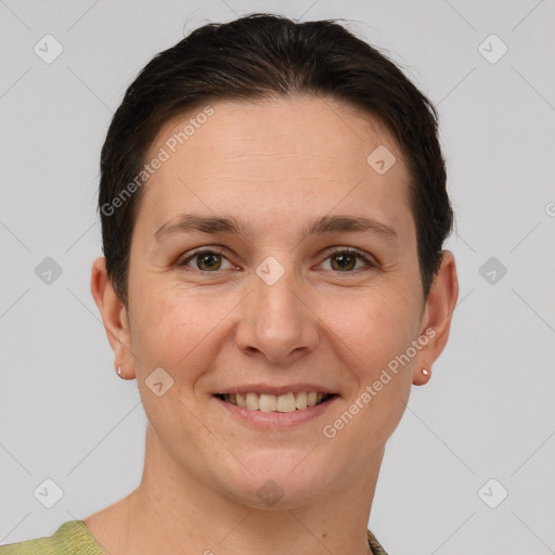 Joyful white adult female with short  brown hair and brown eyes