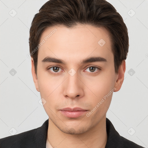 Neutral white young-adult male with short  brown hair and brown eyes