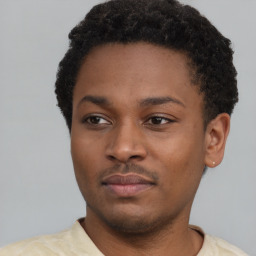 Neutral latino young-adult male with short  brown hair and brown eyes