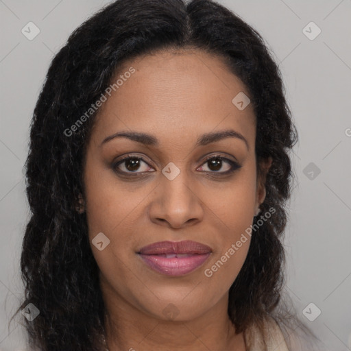 Joyful black young-adult female with long  brown hair and brown eyes