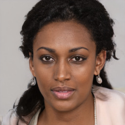 Neutral black young-adult female with medium  black hair and brown eyes