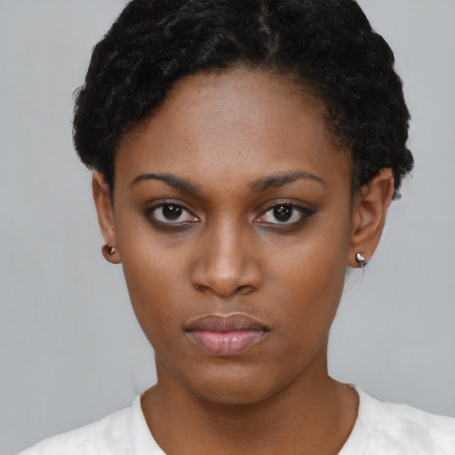 Neutral black young-adult female with short  black hair and brown eyes