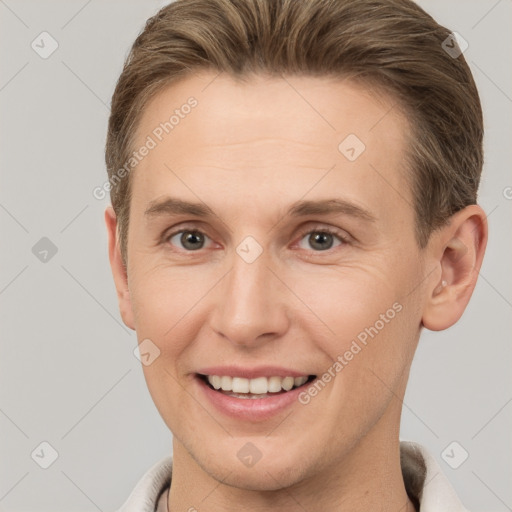 Joyful white adult female with short  brown hair and brown eyes