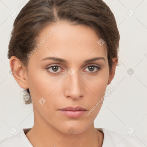 Neutral white young-adult female with short  brown hair and brown eyes