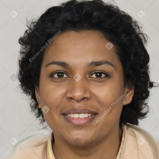 Joyful black adult female with short  brown hair and brown eyes