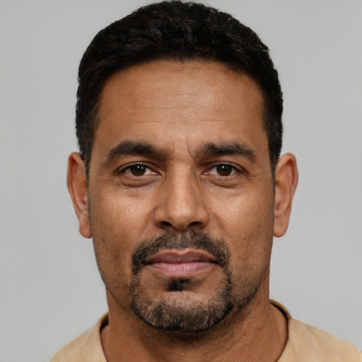 Neutral black adult male with short  black hair and brown eyes