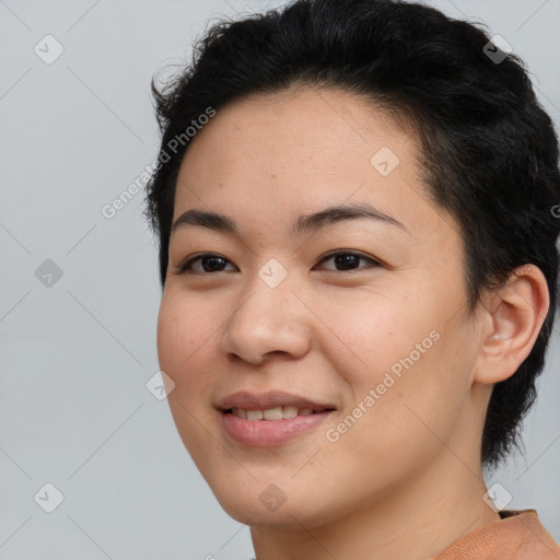 Joyful asian young-adult female with short  brown hair and brown eyes